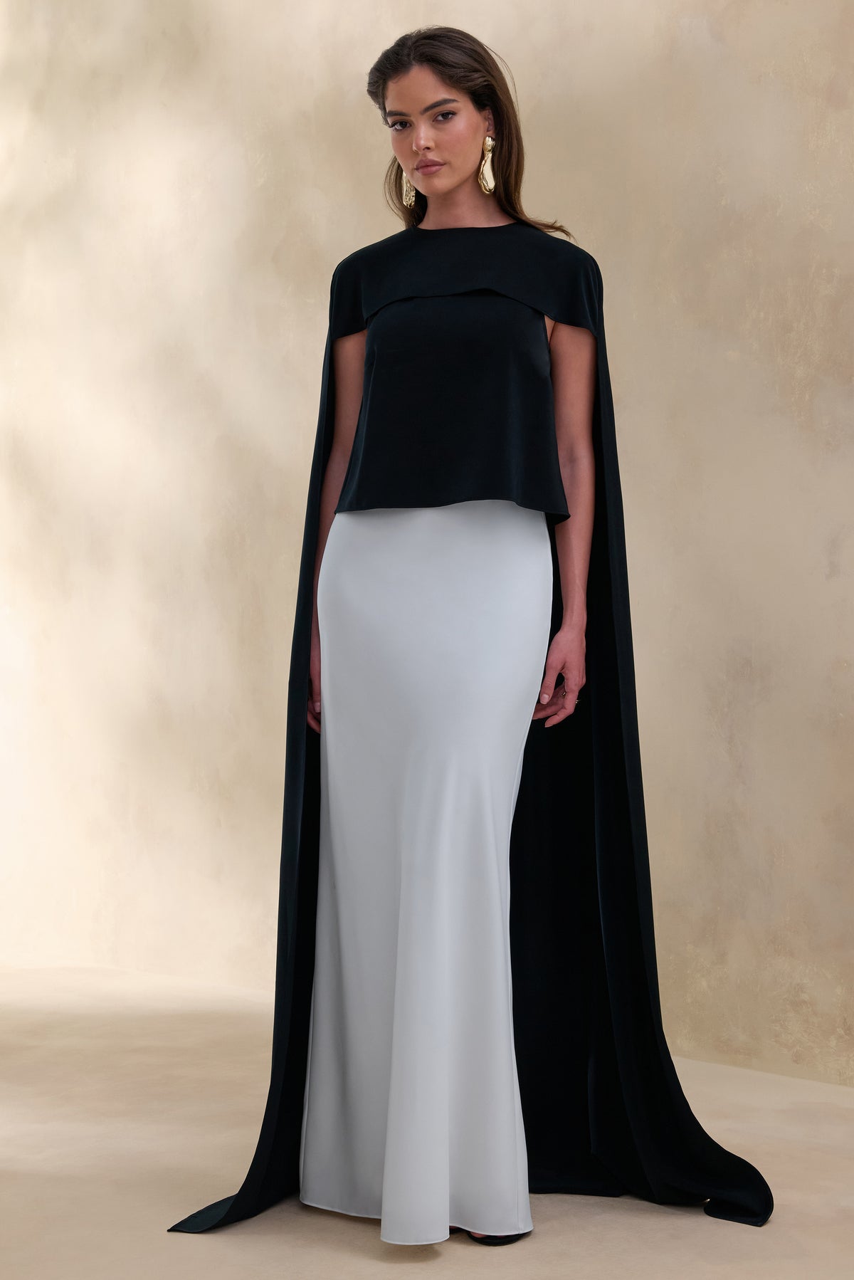 ECM_HR_CL137777001 - Aetheria | Black Satin High-Neck Top With Cape + ECM_HR_CL137855110 - Iveta | White Satin Maxi-Skirt 3.jpg