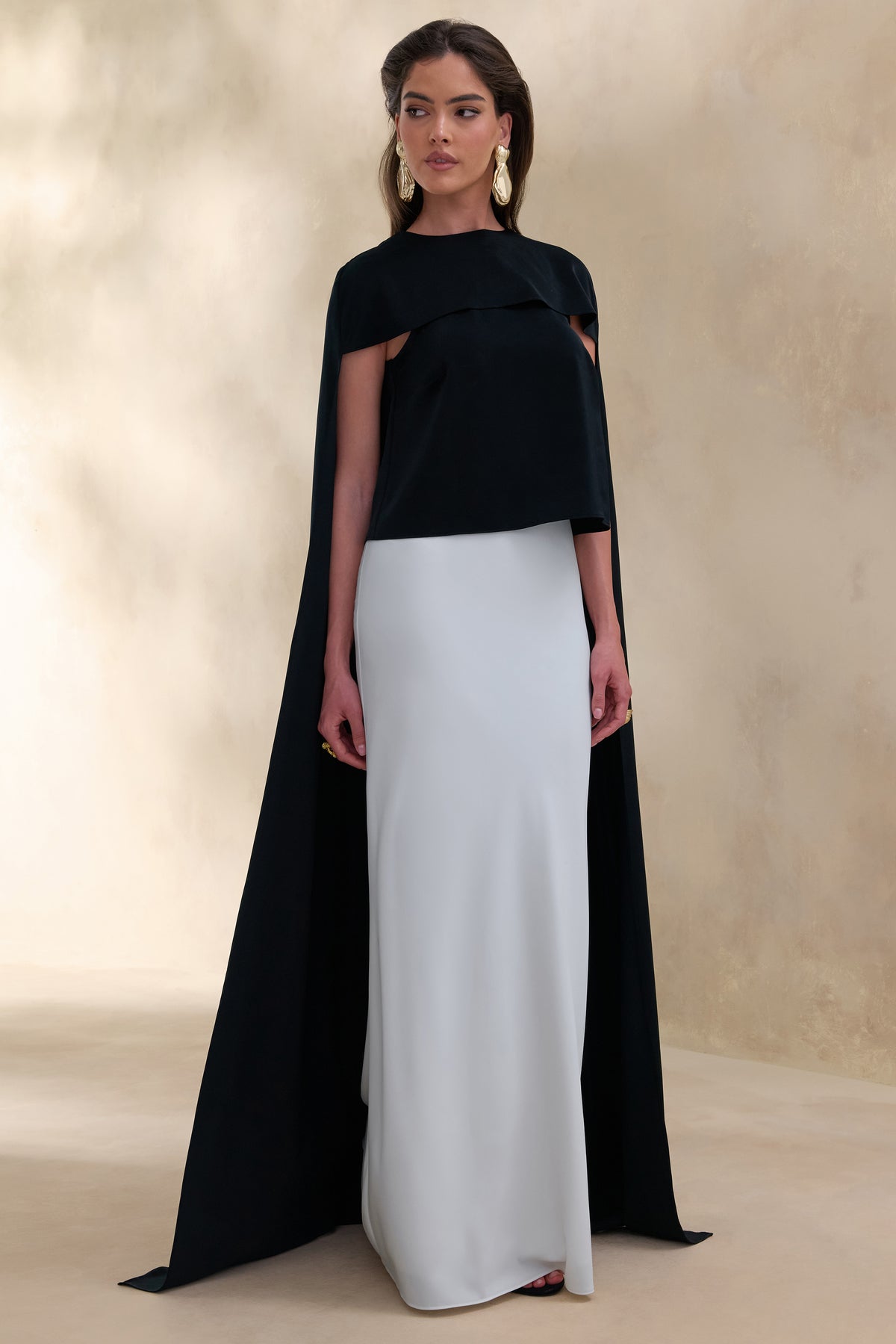 ECM_HR_CL137777001 - Aetheria | Black Satin High-Neck Top With Cape + ECM_HR_CL137855110 - Iveta | White Satin Maxi-Skirt 6.jpg