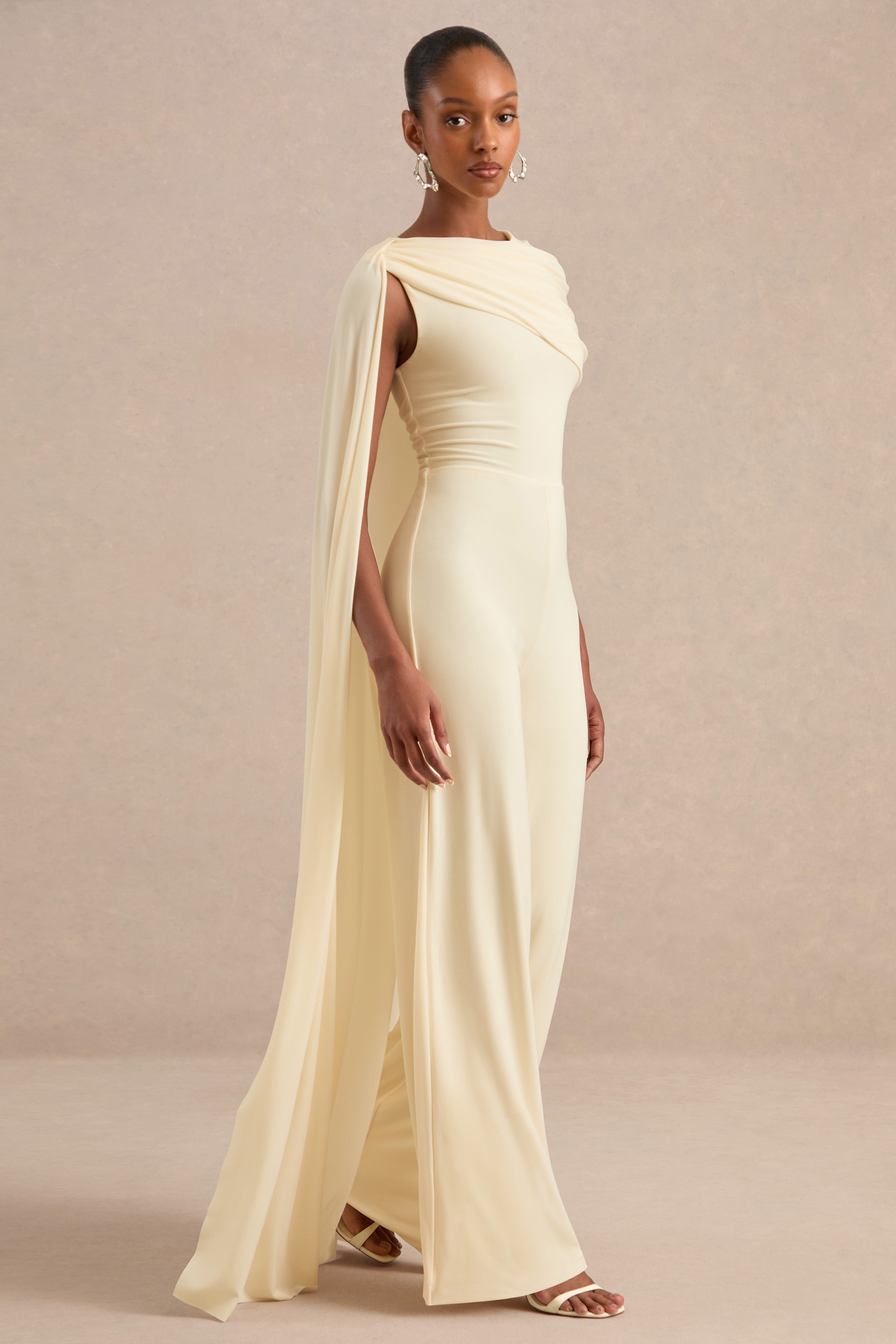 ECM_HR_CL138262111 - Emelisse Cream Round-Neck Jumpsuit With Gathered Detailing And Sash2.jpg