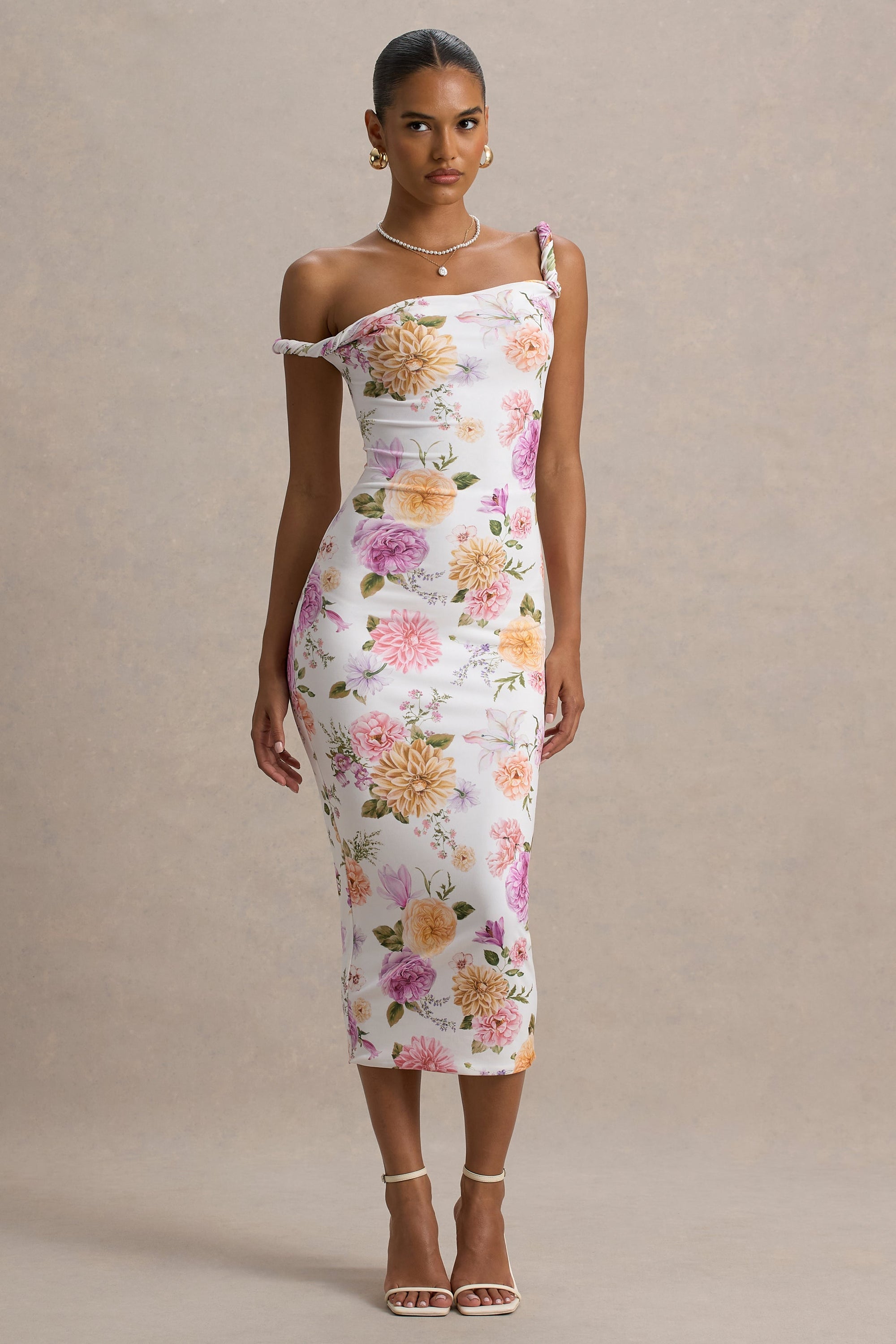 Nora | Pfirsich- und fliederfarbenes Midikleid mit Blumenprint und asymmetrischem Ausschnitt